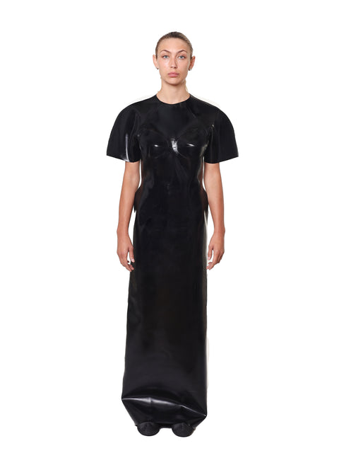 Woman wearing HARRI EXCLUSIVE black maxi evening dress with sculpted bust and short sleeves