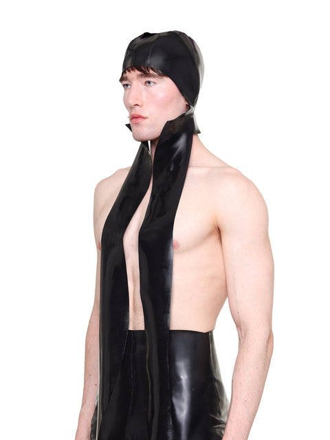HARRI black scarf cap worn by a male model featuring a sleek, shiny design with long scarf ends