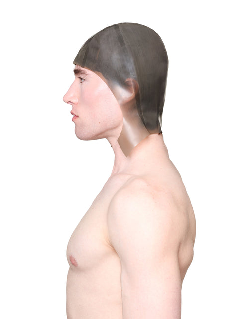 Profile of a shirtless man wearing a grey cap with ear flaps made by HARRI