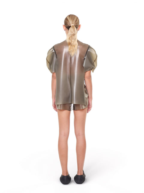 Back view of HARRI Grey Short Sleeve Structured Cape Top worn with matching shorts
