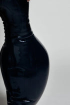 Black inflatable latex trousers by HARRI EXCLUSIVE with glossy finish and structured design