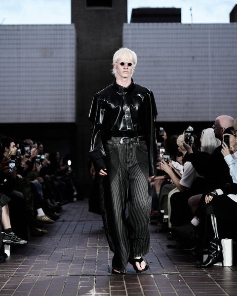 HARRI Black shirt paired with printed black jeans