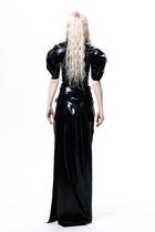 Black Draped Deflated Maxi Skirt by HARRI EXCLUSIVE worn by model from the back showing glossy fabric and long silhouette