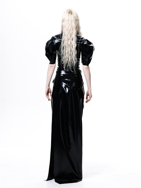Black Draped Deflated Maxi Skirt by HARRI EXCLUSIVE worn by model from the back showing glossy fabric and long silhouette