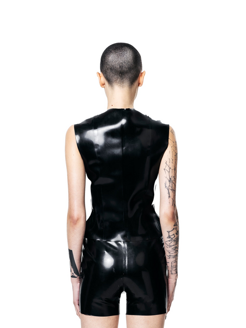 Back view of black fitted zip-up vest top by HARRI on model with tattoos and shaved head