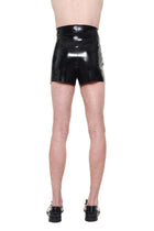 Black High Waist Essential Biker Shorts by HARRI shown from back on model with black shoes