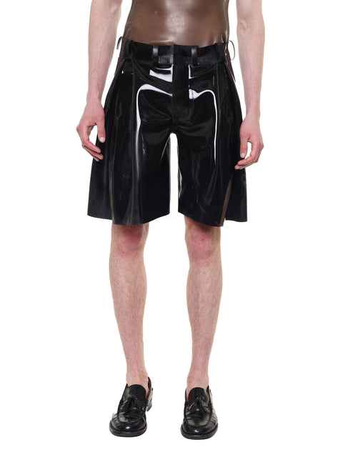Black Knee Length Pleated Shorts by HARRI made of shiny material worn with black shoes