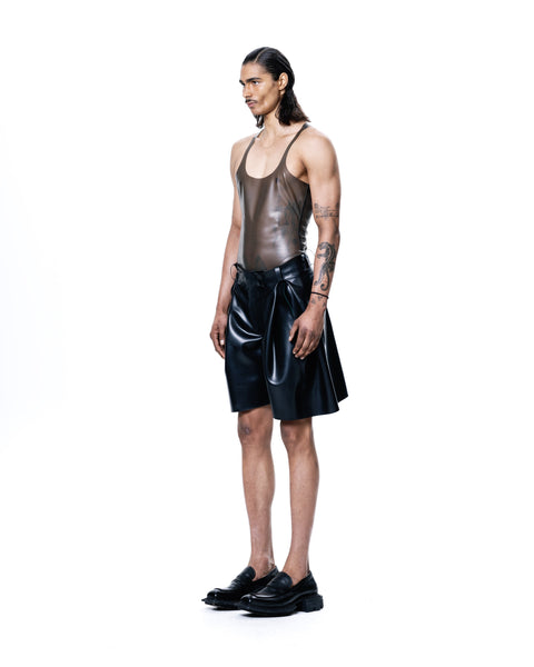 Black Knee Length Pleated Shorts by HARRI worn by male model with tank top and black shoes