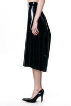 HARRI Black Pleated Skirt with high waist design worn with black high heels