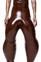 HARRI EXCLUSIVE Brown Alien Legs Inflatable Trousers with oversized, inflated design on model