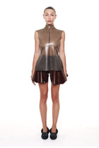 Brown High Waist Flared Shorts by HARRI worn by model with sleeveless brown top and black shoes