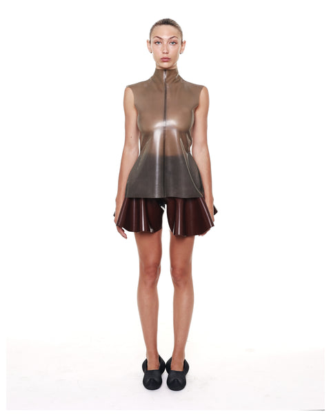 Brown High Waist Flared Shorts by HARRI worn by model with sleeveless brown top and black shoes