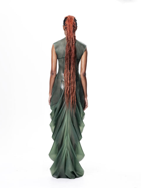 Back view of model wearing Green High Neck Draped Maxi Dress by HARRI EXCLUSIVE with long layered fabric design