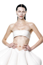 Woman wearing white HARRI Tube Top paired with a voluminous white skirt on a white background
