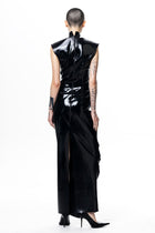 Back view of model wearing HARRI EXCLUSIVE black Shrimp Dress with high collar and sleek glossy finish