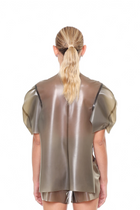 Back view of Grey Short Sleeve Structured Cape Top by HARRI worn by model with ponytail hairstyle