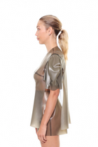 Grey Short Sleeve Structured Cape Top by HARRI worn by model in side profile with ponytail hairstyle