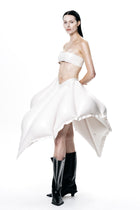 White V-Waisted Inflatable Midi Skirt by HARRI EXCLUSIVE worn with black boots and white bandeau top
