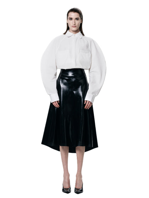 Black Pleated Skirt by HARRI London — front view on model
